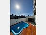 Piscina com Deck de madeira