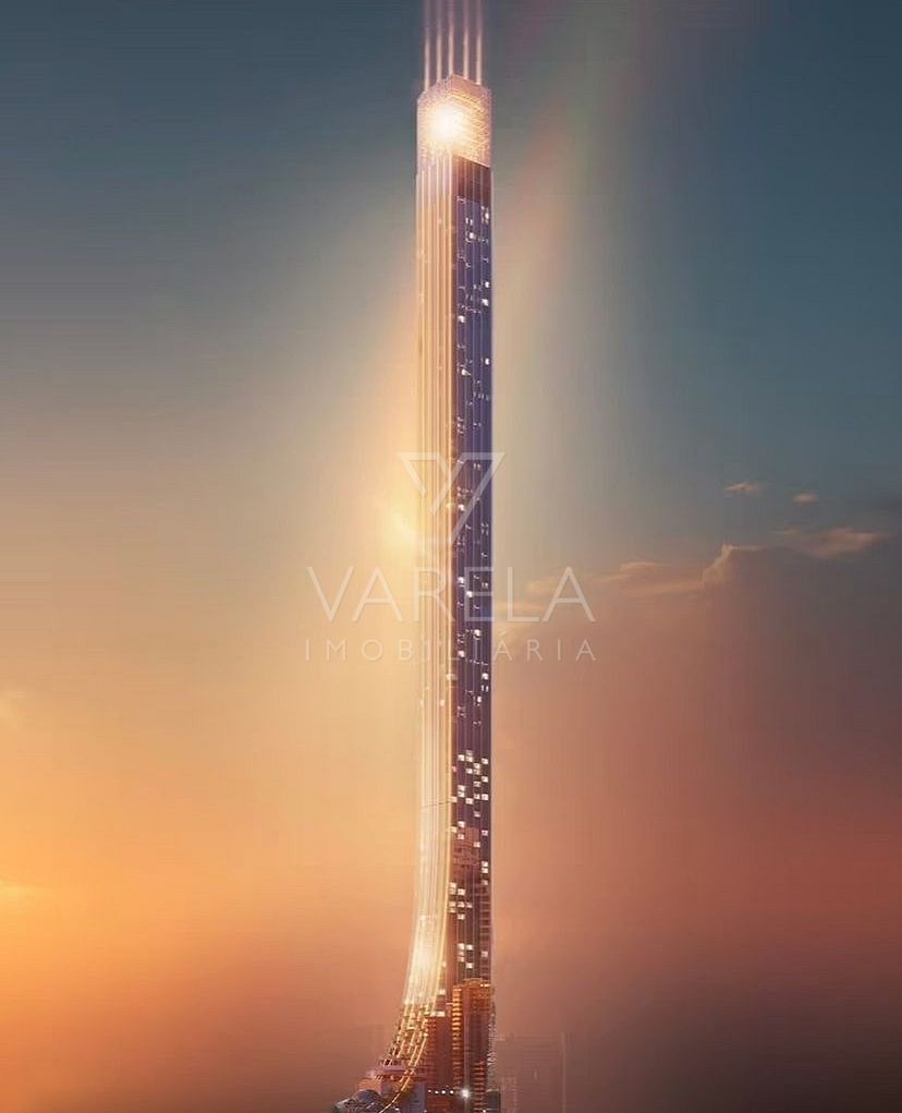 Render de divulgação da torre do Senna Tower isolada contra o céu alaranjado em Balneário Camboriú